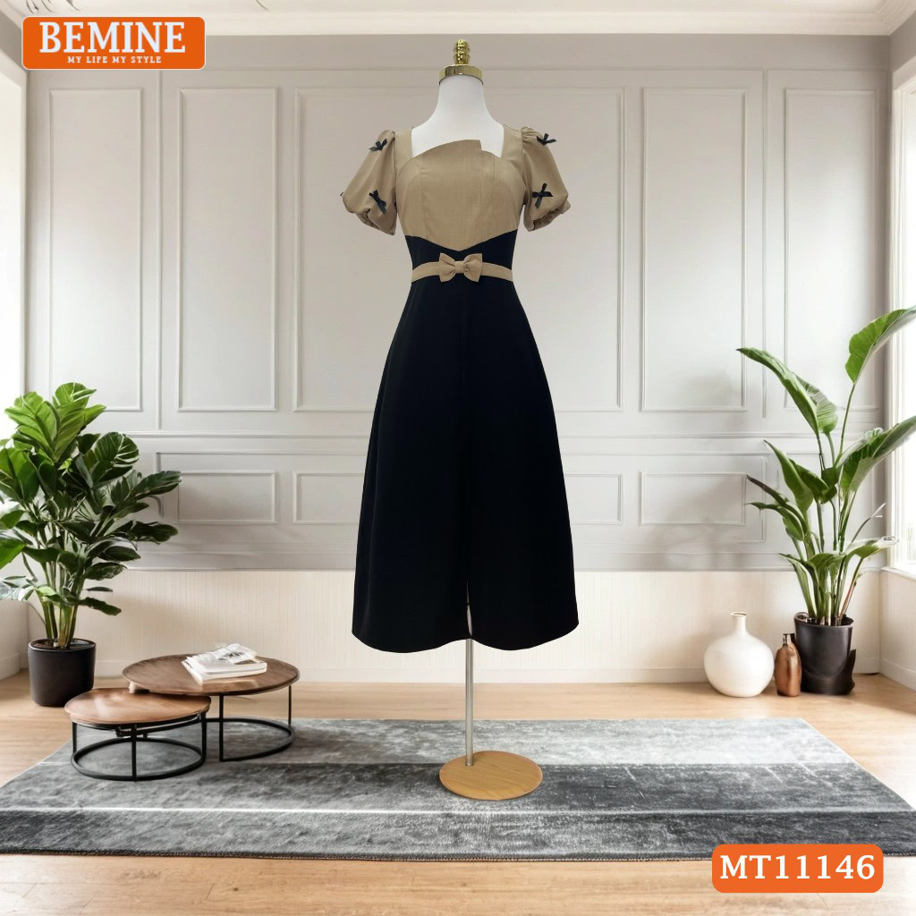 Mẫu đầm công sở BEMINE MT11146 với thiết kế cổ vuông hiện đại giúp tôn lên nét đẹp xương quai xanh.