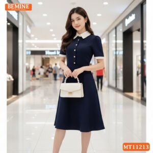 Ảnh cận cảnh hàng cúc đính tỉ mỉ và phần cổ đức sắc sảo trên mẫu đầm thiết kế BEMINE MT11213.