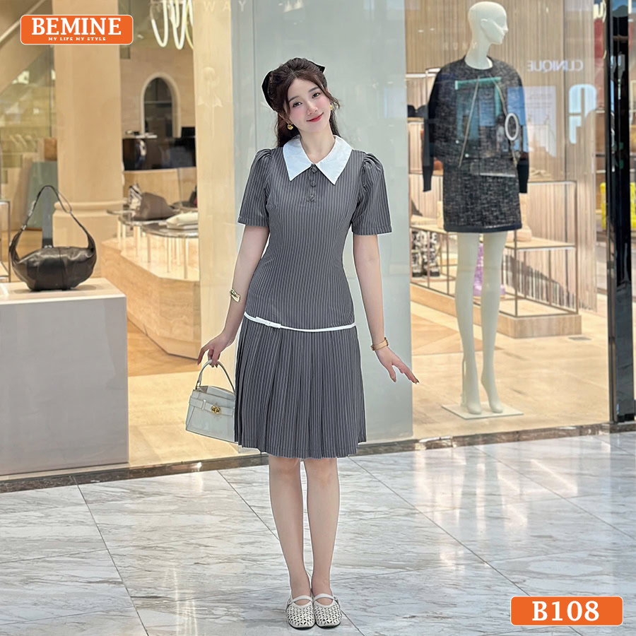 Ảnh cận cảnh chi tiết cổ đức và các viên cúc đính dọc thân của đầm thiết kế BEMINE B108.