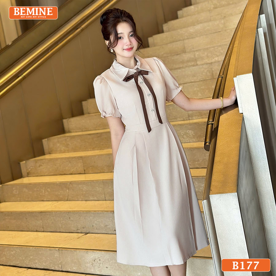 Chi tiết nơ thắt duyên dáng trên cổ sơ mi của chiếc đầm công sở BEMINE B177.