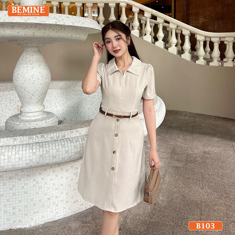 Đầm thiết kế BEMINE cổ đức khóa kéo trước B103 dáng chữ A phù hợp đi làm Góc chụp tập trung vào phần cổ đức và chức năng khóa kéo trước của đầm thiết kế BEMINE B103
