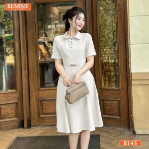 Đầm thiết kế BEMINE B143 màu xanh, dáng chữ A, cổ đức, đai eo, mang phong cách trẻ trung, năng động.