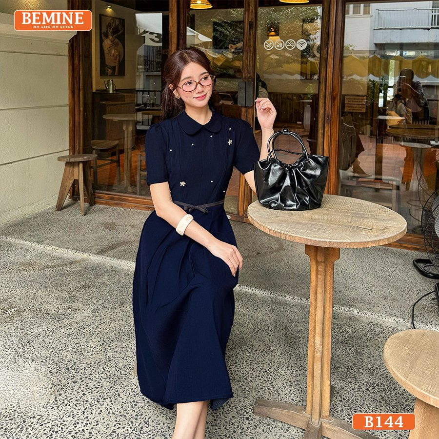 Đầm thiết kế BEMINE Xếp Ly Đi Tiệc Cổ Sen Đính Đá B144 màu hồng san hô.