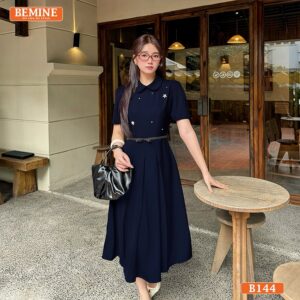 Mẫu đầm dự tiệc BEMINE B144 với chi tiết cổ sen và đính đá, tùng váy xếp ly sang trọng.