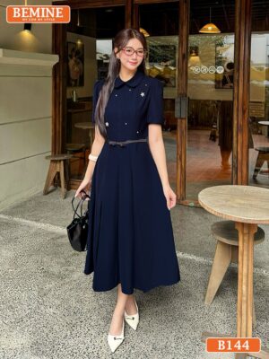 Đầm thiết kế BEMINE B144 màu xanh ngọc, xếp ly, cổ sen, chi tiết đính đá ở cổ.