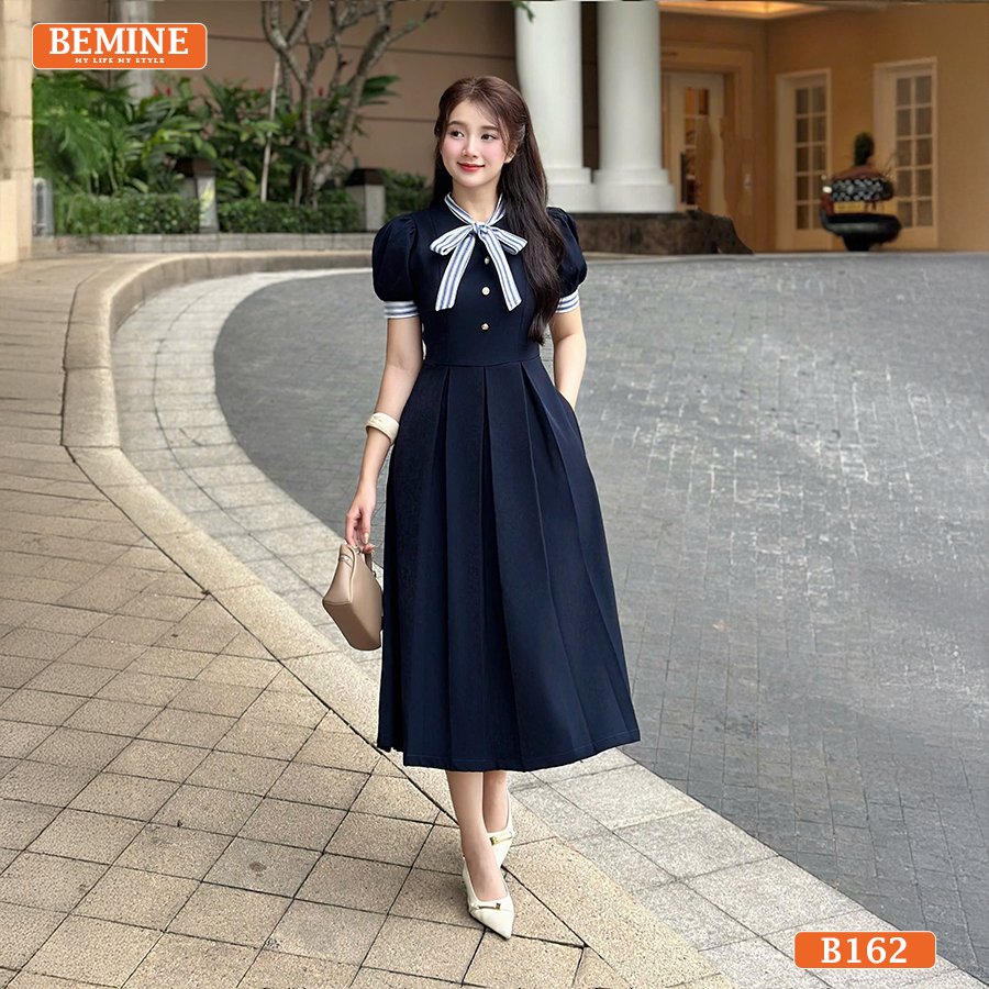 Đầm BEMINE cổ trụ phối sọc nơ B162 dáng A hồng phấn dịu dàng dự tiệc