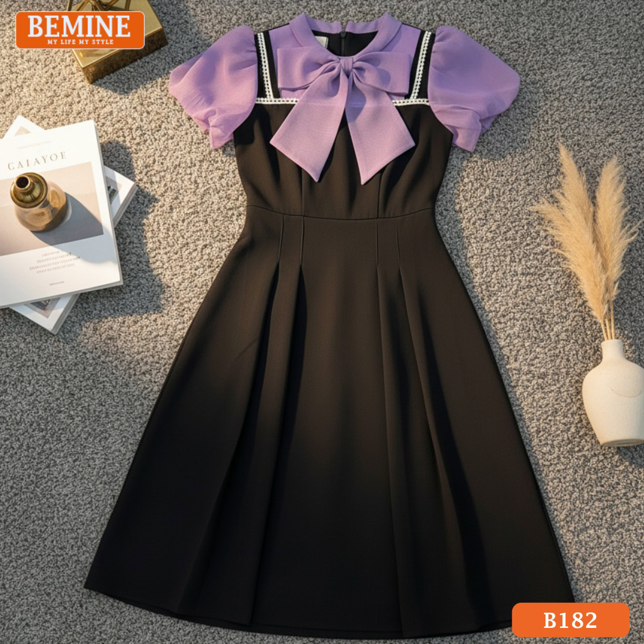 Đầm thiết kế BEMINE B182 chất liệu vải đứng form, giúp tôn dáng và che khuyết điểm hiệu quả.