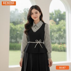 Mẫu đầm công sở BEMINE B187 dáng chữ A, nổi bật với cổ sơ mi và họa tiết kẻ caro màu ghi/xám.
