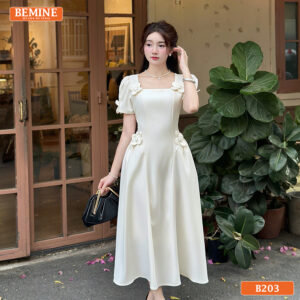 Đầm thiết kế BEMINE B203 dáng chữ A thanh lịch, cổ vuông hiện đại phối đính hoa thủ công.