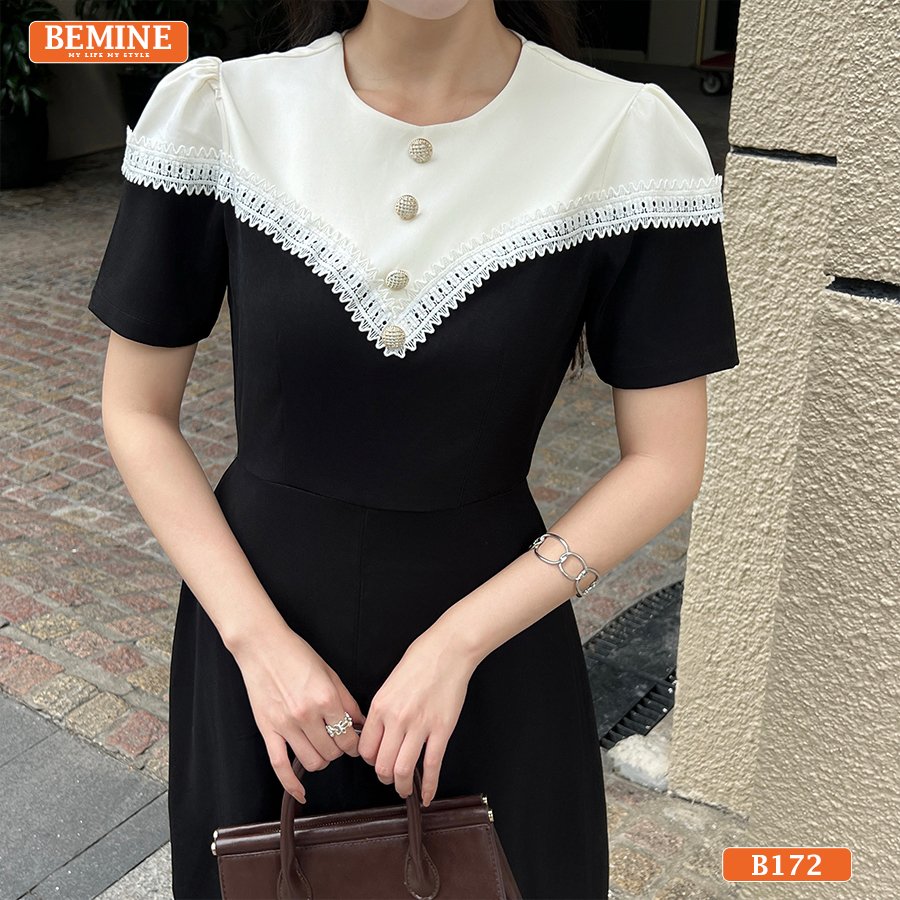 Đầm BEMINE cổ tròn B172, tay lỡ, viền ren đen tạo điểm nhấn tương phản.
