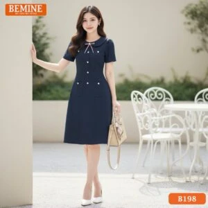 Mẫu đầm công sở BEMINE B198 với điểm nhấn cổ sen và nơ thắt tinh tế, mang lại vẻ ngoài trẻ trung.