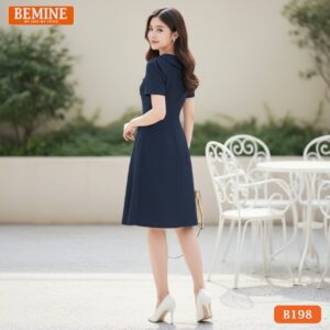 Đầm thiết kế BEMINE B198 dáng chữ A thanh lịch, thiết kế cổ sen phối đính nơ duyên dáng.