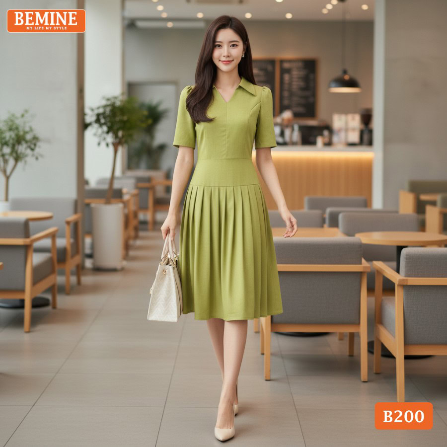 Đầm sát nách BEMINE màu be nhã nhặn. Thiết kế cổ V nhẹ và bản vai rộng giúp vai trông nhỏ hơn.
