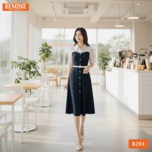 Mẫu đầm công sở BEMINE B201 với thiết kế cổ sơ mi phối tơ bi mang lại vẻ ngoài nữ tính, thanh lịch.