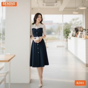 Ảnh cận cảnh chi tiết chất liệu tơ bi mềm mại trên cổ áo của mẫu đầm thiết kế BEMINE B201.