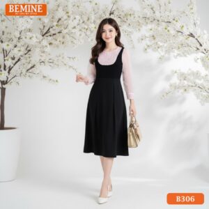 Ảnh cận cảnh chi tiết nhún bèo và chất liệu vải của đầm thiết kế BEMINE B306, chất liệu đứng form.