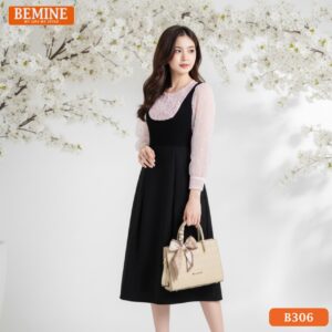 Mẫu đầm công sở BEMINE B306 dáng chữ A, nổi bật với chi tiết nhún bèo ở cổ hoặc tay áo.