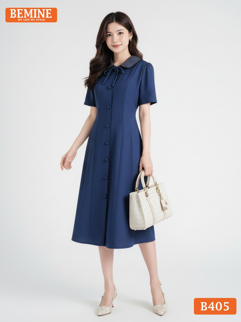 Góc chụp chi tiết phần thân trên của đầm BEMINE B405, làm nổi bật chất lượng vải đứng form và ít nhăn.
