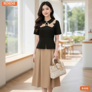Người mẫu diện đầm BEMINE B406 dáng peplum công sở, mang lại vẻ ngoài chuyên nghiệp và hiện đại.