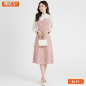 Người mẫu diện đầm BEMINE B196 màu hồng, dáng chữ A phối tay tơ, phong cách tiểu thư công sở.
