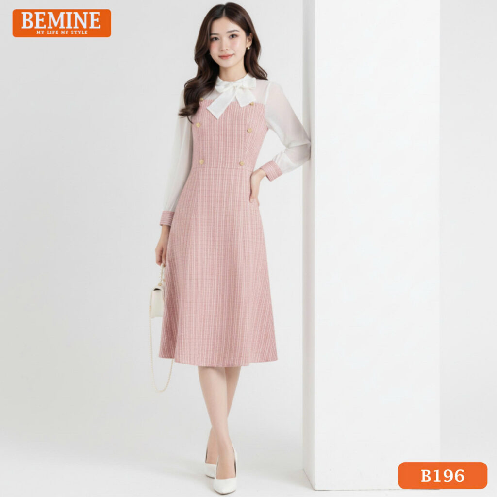 Đầm thiết kế BEMINE B196 màu hồng (HONG) dáng chữ A, cổ tròn phối tay tơ dài thanh lịch.