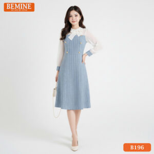 Người mẫu diện đầm BEMINE B196 màu xanh, dáng chữ A phối tay tơ, phong cách chuyên nghiệp.
