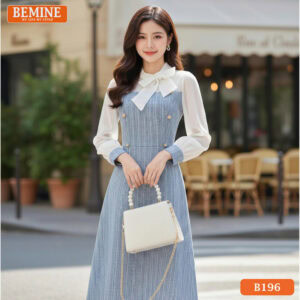 Chi tiết tay dài cài nút và chất liệu tùng váy chữ A chuẩn phom của mẫu đầm công sở BEMINE B196.