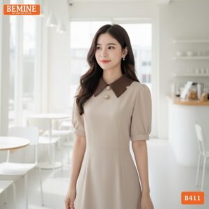 Người mẫu diện đầm BEMINE B411 dáng chữ A, phong cách thời trang công sở hiện đại và đầy cuốn hút.