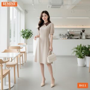 Mẫu đầm công sở BEMINE B411 thiết kế cổ phối họa tiết bắt mắt, tạo diện mạo mới mẻ cho nàng văn phòng.