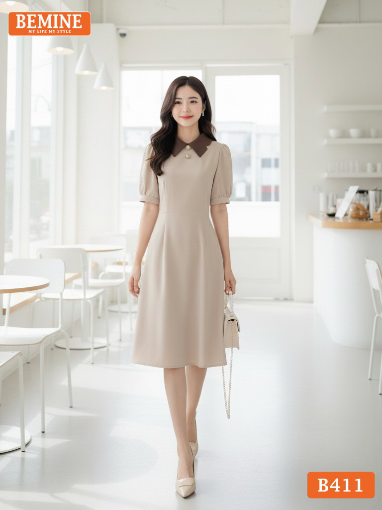 Chi tiết đường may sắc sảo và phần cổ phối họa tiết sắc nét trên mẫu đầm công sở BEMINE B411.