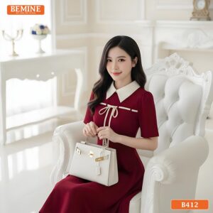 Người mẫu diện đầm BEMINE B412 dáng chữ A, phong cách thời trang văn phòng hiện đại và chỉn chu.