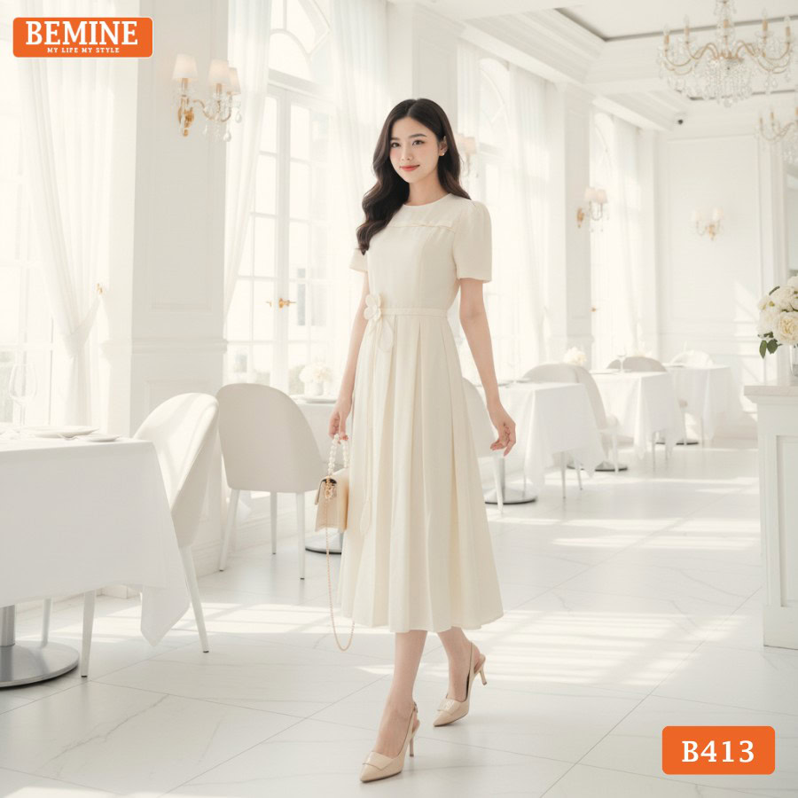 Mẫu đầm thiết kế BEMINE cổ tròn đính hoa eo xếp ly B413 chính là sự kết hợp hoàn mỹ giữa nét cổ điển và hơi thở hiện đại.