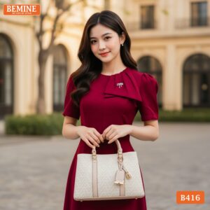 Mẫu đầm thiết kế BEMINE dáng chữ a cổ tròn vai phồng B416 là sản phẩm tiêu biểu cho phong cách thời trang công sở hiện đại