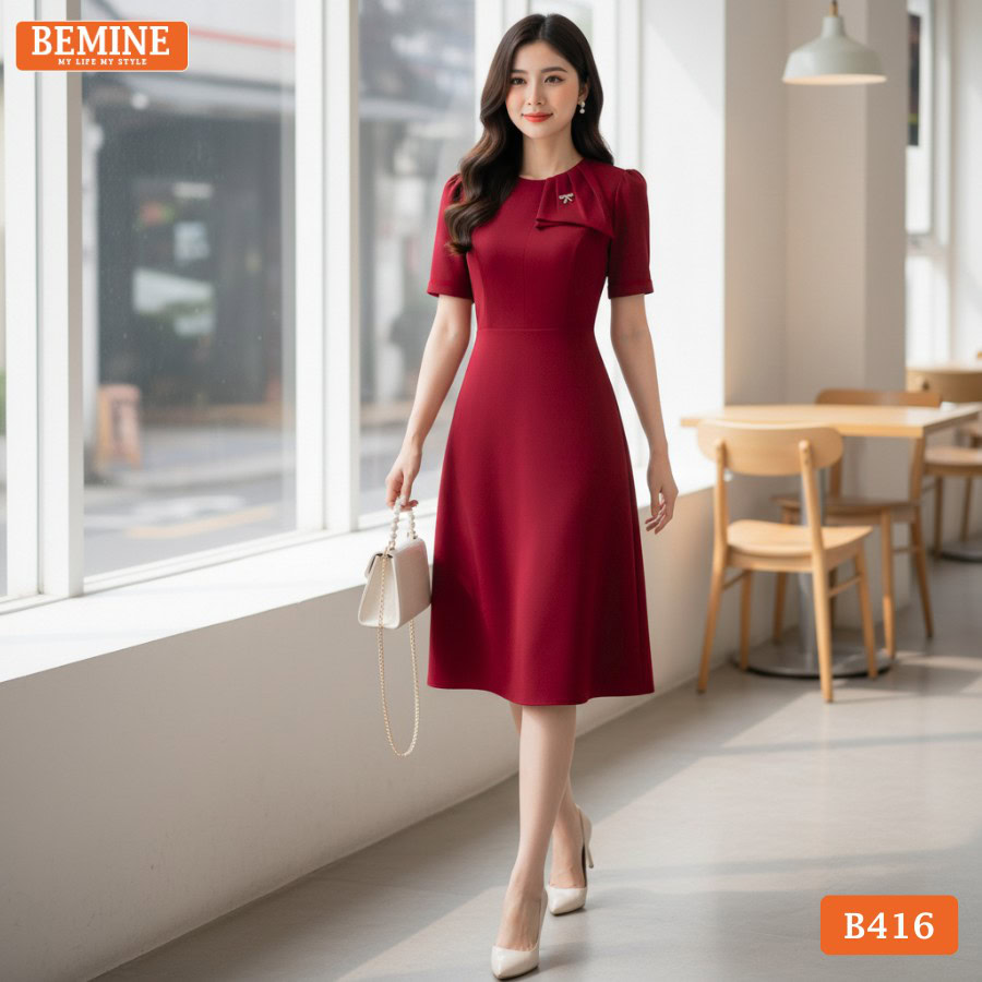Mẫu đầm công sở BEMINE B416 thiết kế vai phồng che khuyết điểm bắp tay.