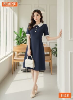 Người mẫu diện đầm BEMINE B418 đi làm chuyên nghiệp.