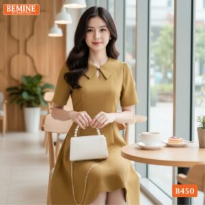 Ảnh chụp toàn thân đầm thiết kế BEMINE B450 màu vàng công sở.