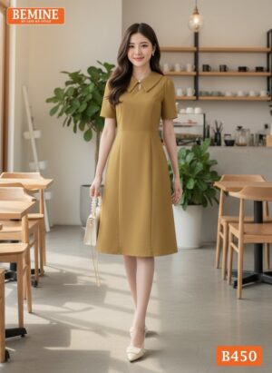 Người mẫu diện đầm BEMINE B450 màu vàng trẻ trung và nổi bật.