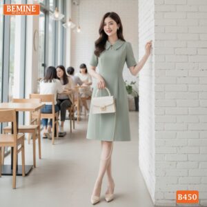 Ảnh chụp toàn thân đầm thiết kế BEMINE B450 màu xanh nhã nhặn.