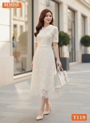 Cận cảnh chất liệu vải và hàng cúc tỉ mỉ của đầm BEMINE T119.