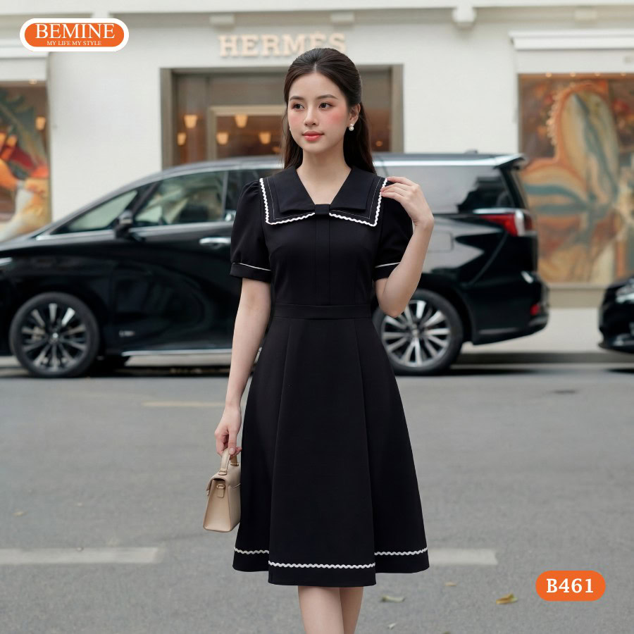 Thiết kế cổ nơ chạy viền tinh tế trên mẫu đầm BEMINE B461.