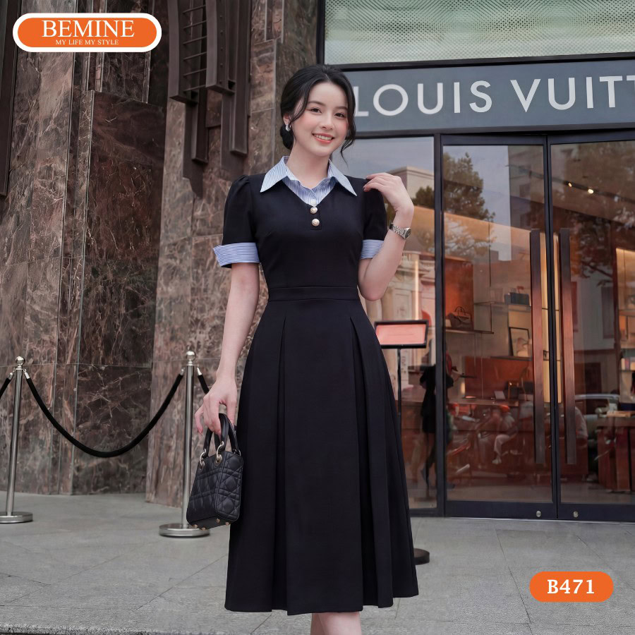 Người mẫu diện đầm chữ a phối kẻ sọc BEMINE mã số B471.