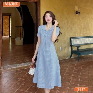Mẫu đầm họa tiết nơ caro BEMINE B497 trẻ trung và hiện đại.