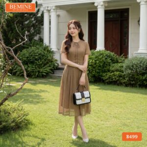 Mẫu đầm BEMINE B499 với chi tiết dây nơ thắt điệu đà.