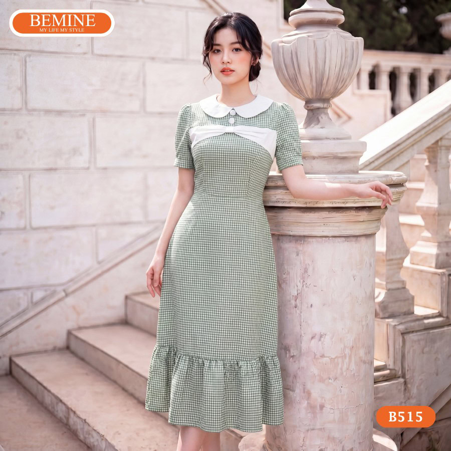 Mẫu đầm thiết kế BEMINE cổ sen phối nơ caro dáng chữ a B515 chính là chất liệu Cotton Caro cao cấp