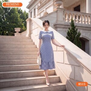 Chi tiết nơ caro tinh tế là điểm nhấn độc đáo trên mẫu đầm cổ sen B515.