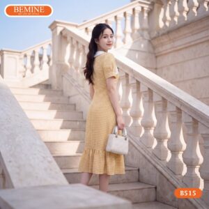 Hình ảnh thực tế đầm nơ caro BEMINE mã sản phẩm B515.