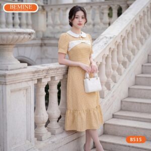 Người mẫu diện đầm chữ a cổ sen BEMINE mã số B515.