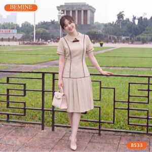 Đầm thiết kế BEMINE B533 cổ sen phối tùng xếp ly trang nhã.
