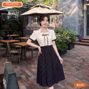 Đầm thiết kế BEMINE B539 cổ tròn phối nơ in bi thanh lịch.