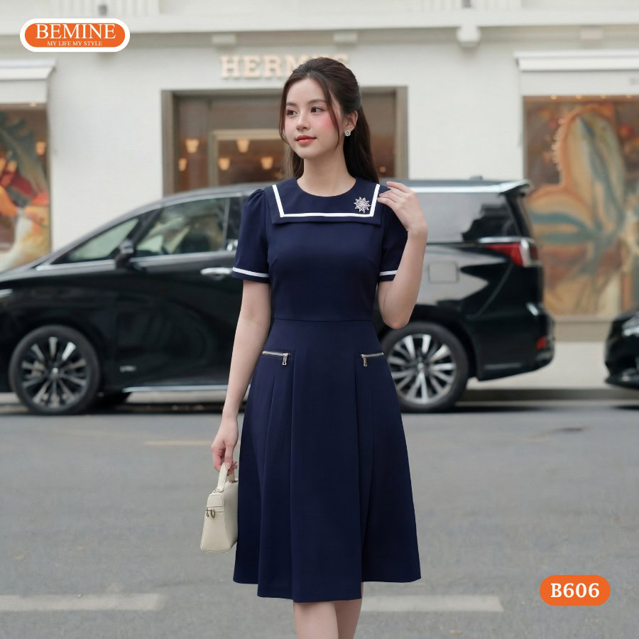 Vòng 2 to nên mặc váy gì: Đầm chữ A BEMINE che bụng hiệu quả.